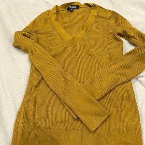 Small green (mustard green?) sweater